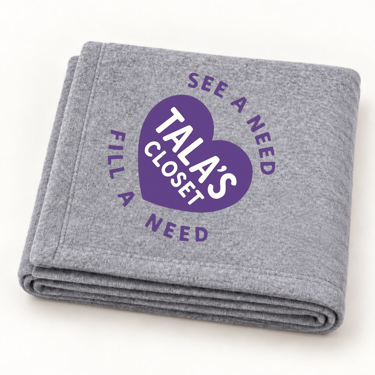 Tala's Closet Sport Grey stadium blanket folded to show purple logo